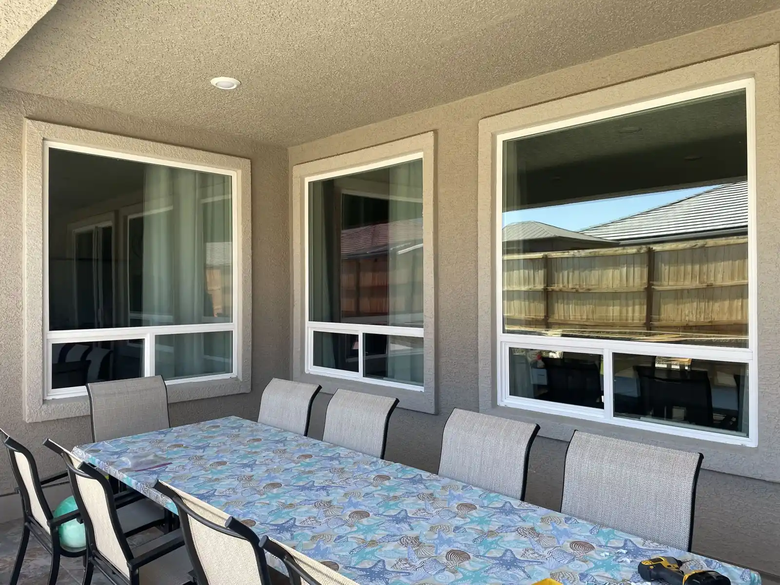 Before: patio windows without solar screens